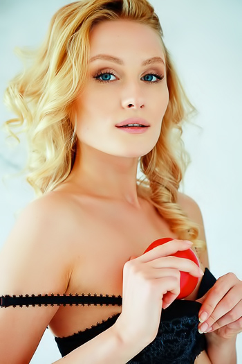 Close up of her smooth, shaved pussy with her legs spread