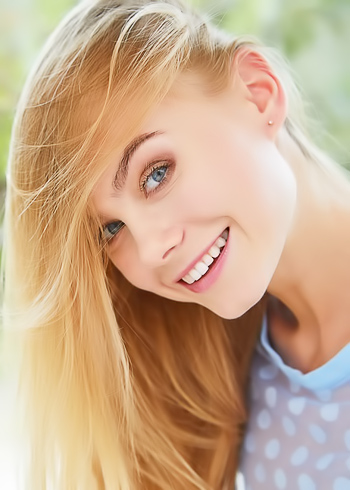 Bright blue eyes make this barely legal teen a seductress